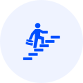 Person climbing stairs with a briefcase, symbolizing career growth and advancement opportunities in the HVAC industry at Precision Air Heating & Cooling.