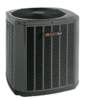 Emergency Heating: Close-up of a dark gray Trane central air conditioning unit, showcasing its louvered design and cooling fan on top.
