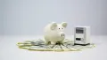 Piggy bank on a fan-shaped arrangement of dollar bills, symbolizing cost savings on HVAC replacement in West Chester PA.