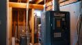 Furnace installation in a residential basement, showcasing HVAC system components and ductwork, relevant to heating repair services in West Chester, PA.
