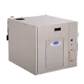 Carrier packaged heat pump unit, showcasing efficient design for space-saving HVAC solutions in residential settings.