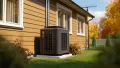 Air conditioning unit outside a home. HVAC system for residential cooling. Air conditioner on a concrete slab. Home AC unit. West Chester, PA.