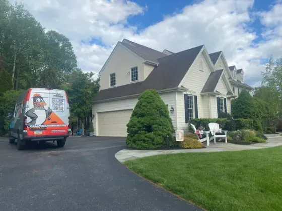 Precision Air van parked in a customer driveway in Chester County
